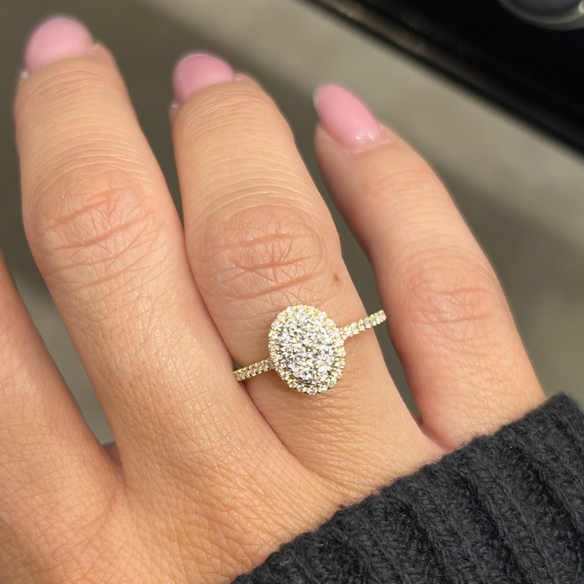 Multiple Diamonds Oval Ring