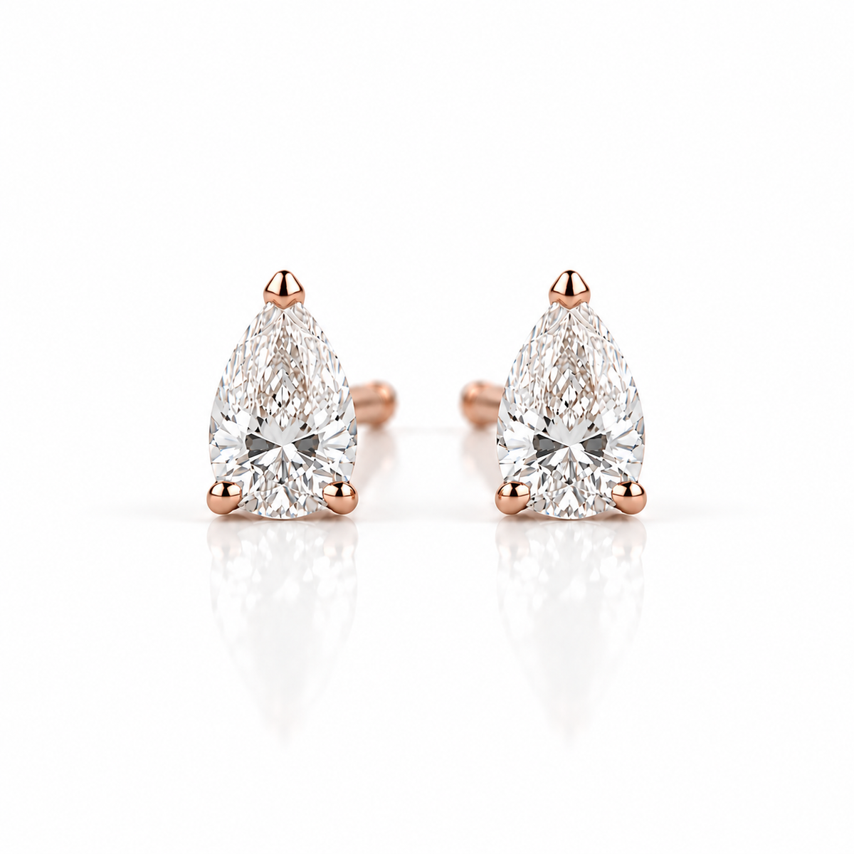 Pear-Cut Solitaire Stud Earrings 0.60ct - 18K Gold